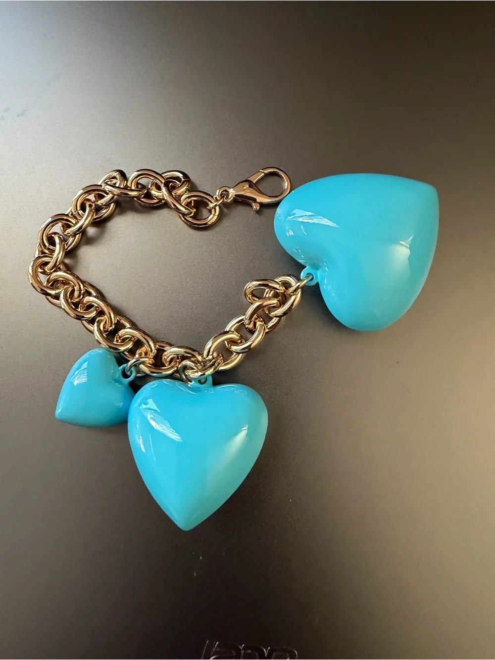 NWOT Roxanne Assoulin Gold Chain Charm with Turquoise Puffy Hearts